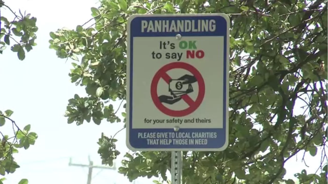 Why is a San Antonio councilman putting up anti-panhandling signs?