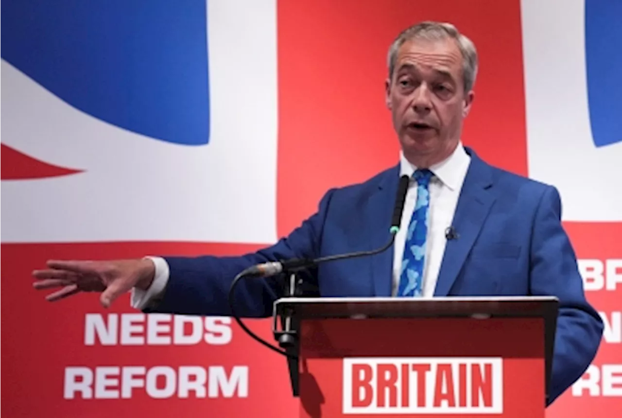 UK right-winger Farage doused with drink at election campaign launch