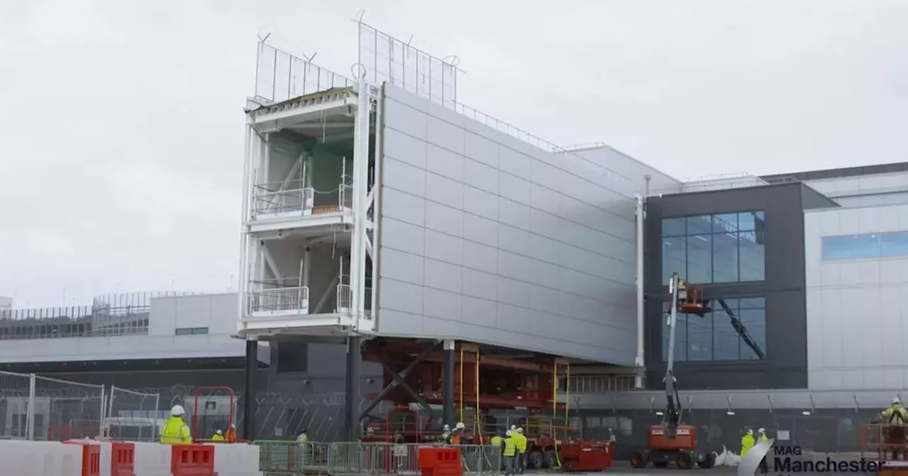 Huge 216-ton bridge lifted into place at Manchester Airport