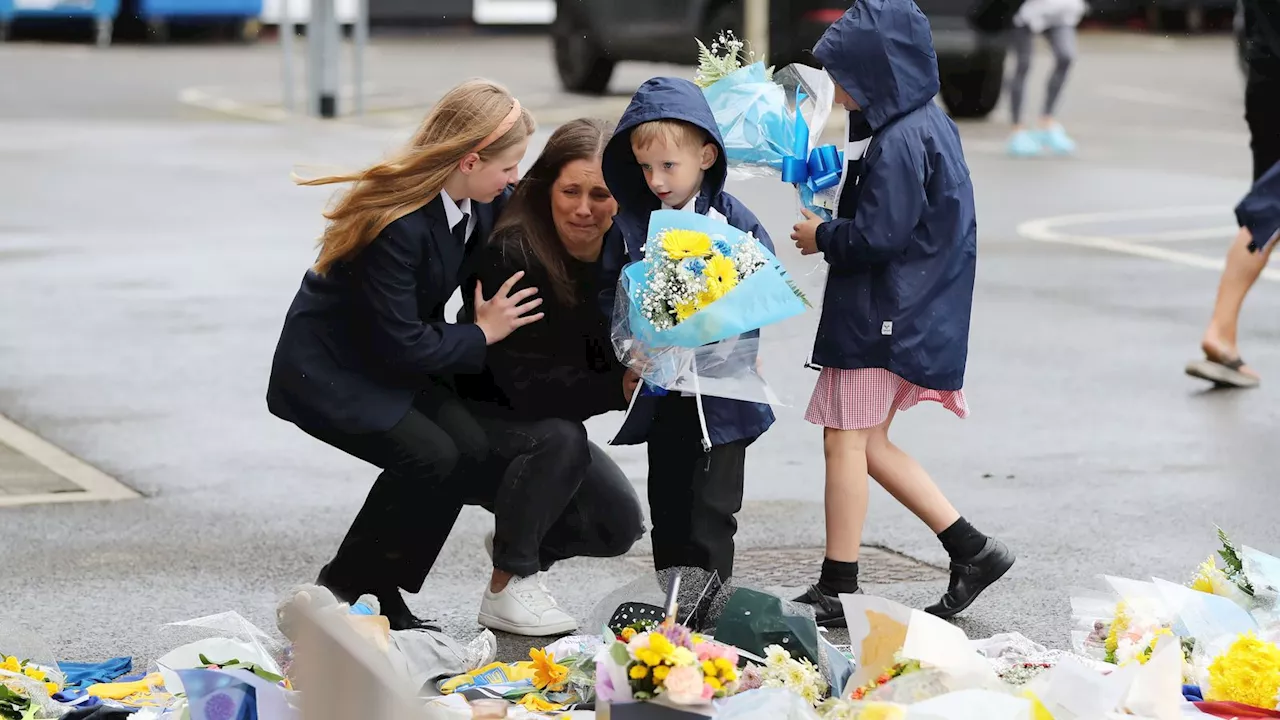 Rob Burrow: Rugby league star's wife and children lay flowers at Headingley Stadium after his death at 41