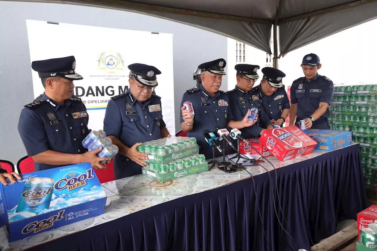 Smugglers declare illicit beers as smartphone accessories, excavator parts at Sabah port