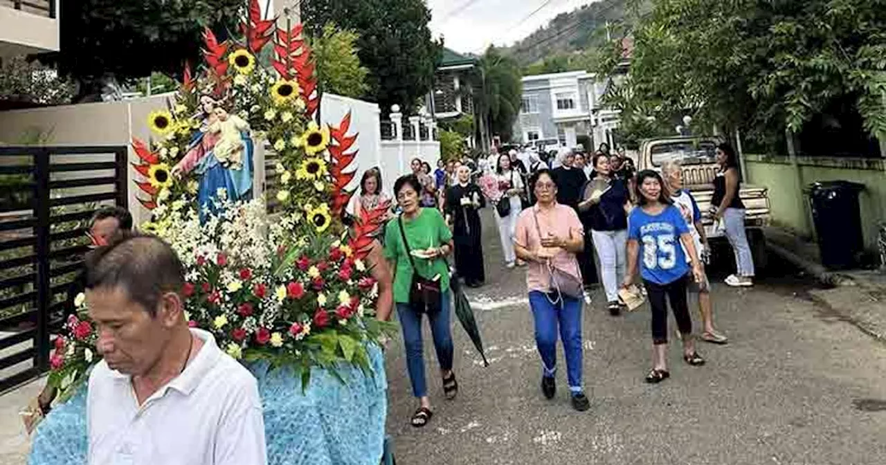 Maryville Subdivision homeowners engage in vibrant religious tradition with Mary Help of Christians procession