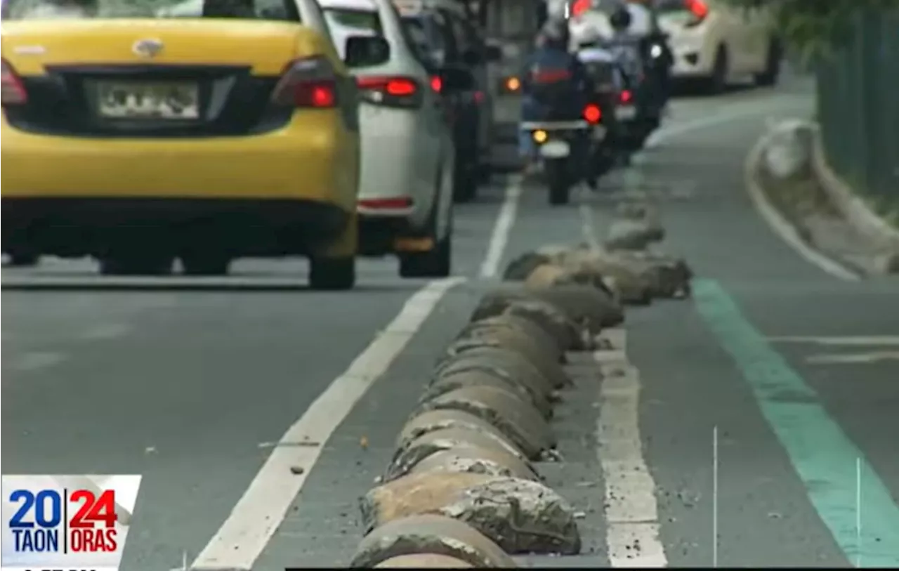 Damaged concrete barriers pose danger to bikers along East Avenue