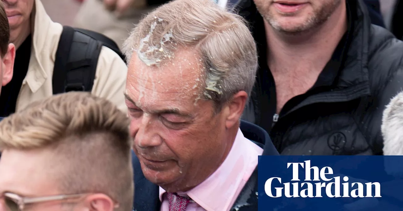 Woman charged after milkshake thrown at Nigel Farage