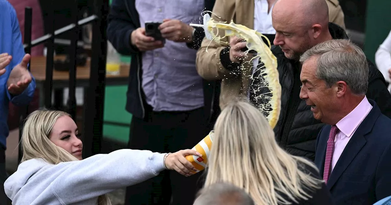 Woman (25) charged with assault and criminal damage after throwing milkshake at Nigel Farage