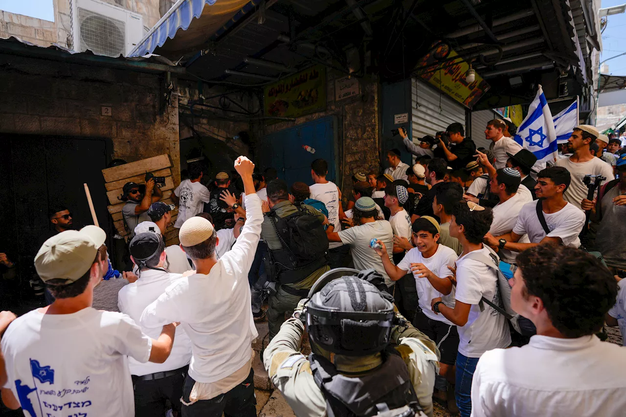 Israeli nationalists march through Palestinian area of Jerusalem, chant 'Death to Arabs'