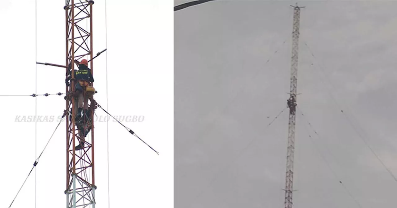 Newly-freed prisoner climbs radio tower out of fear for his life