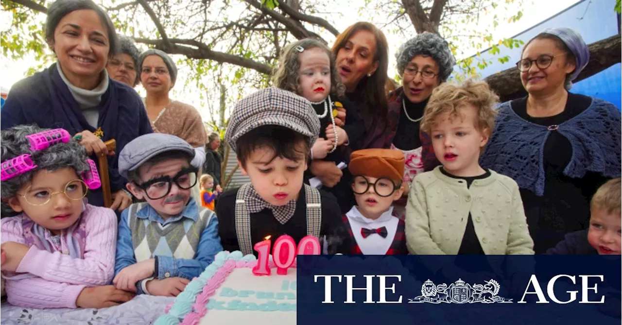 Three cheers as a hardy kindergarten reaches three figures with cake, song and costumes