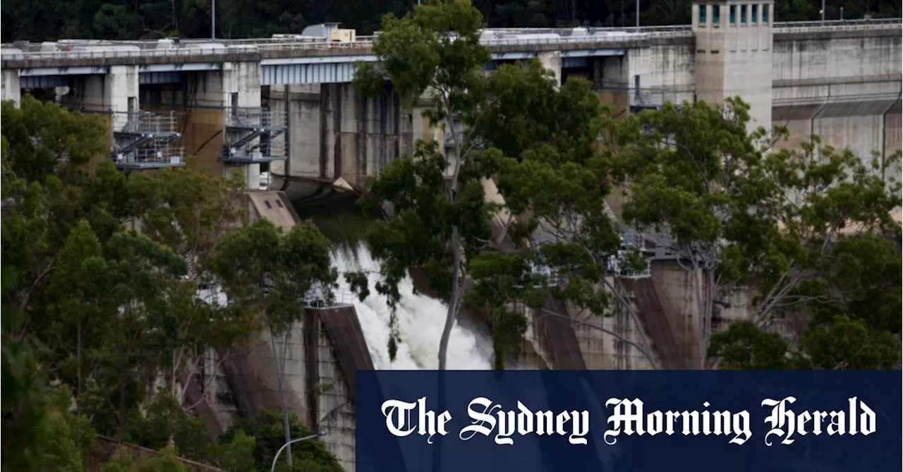 Warragamba Dam spills, suburb prepares to evacuate after deluge