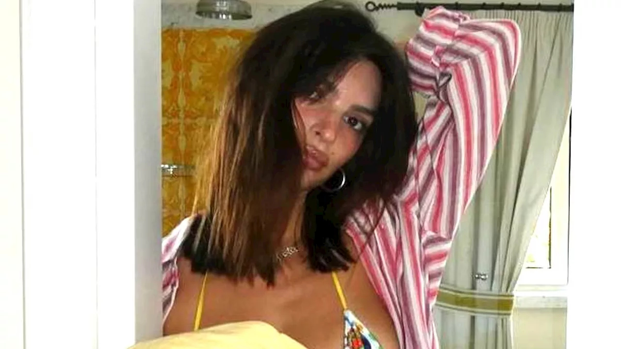 Emily Ratajkowski wows in VERY racy bikini snaps as she shows of her incredible physique to...