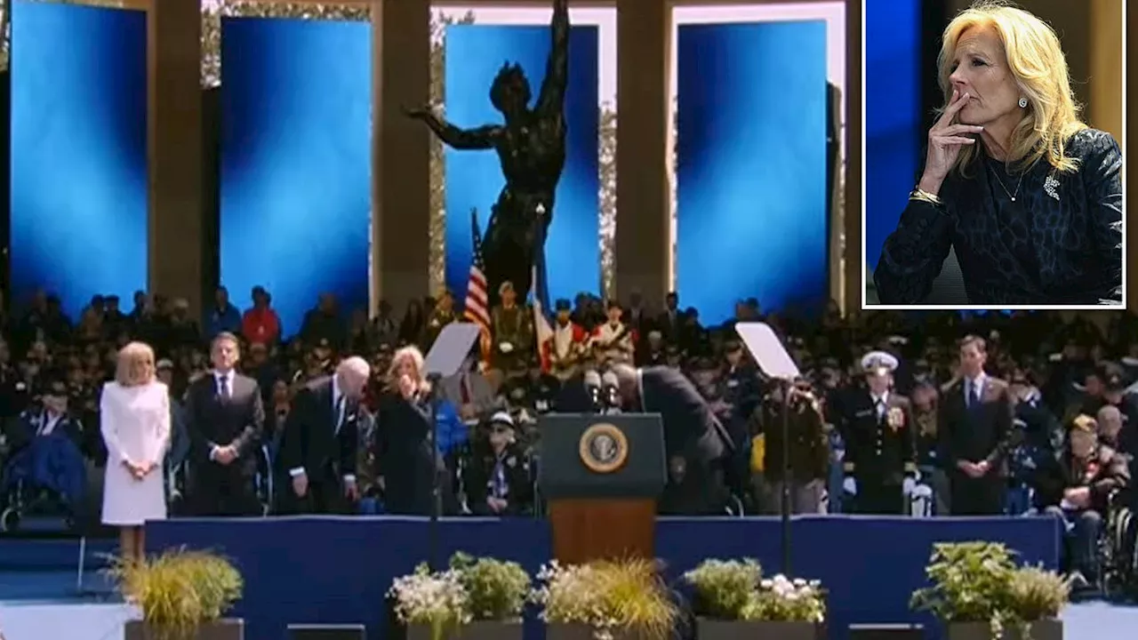 Odd moment Jill covers her mouth as Biden starts to sit at D-Day event