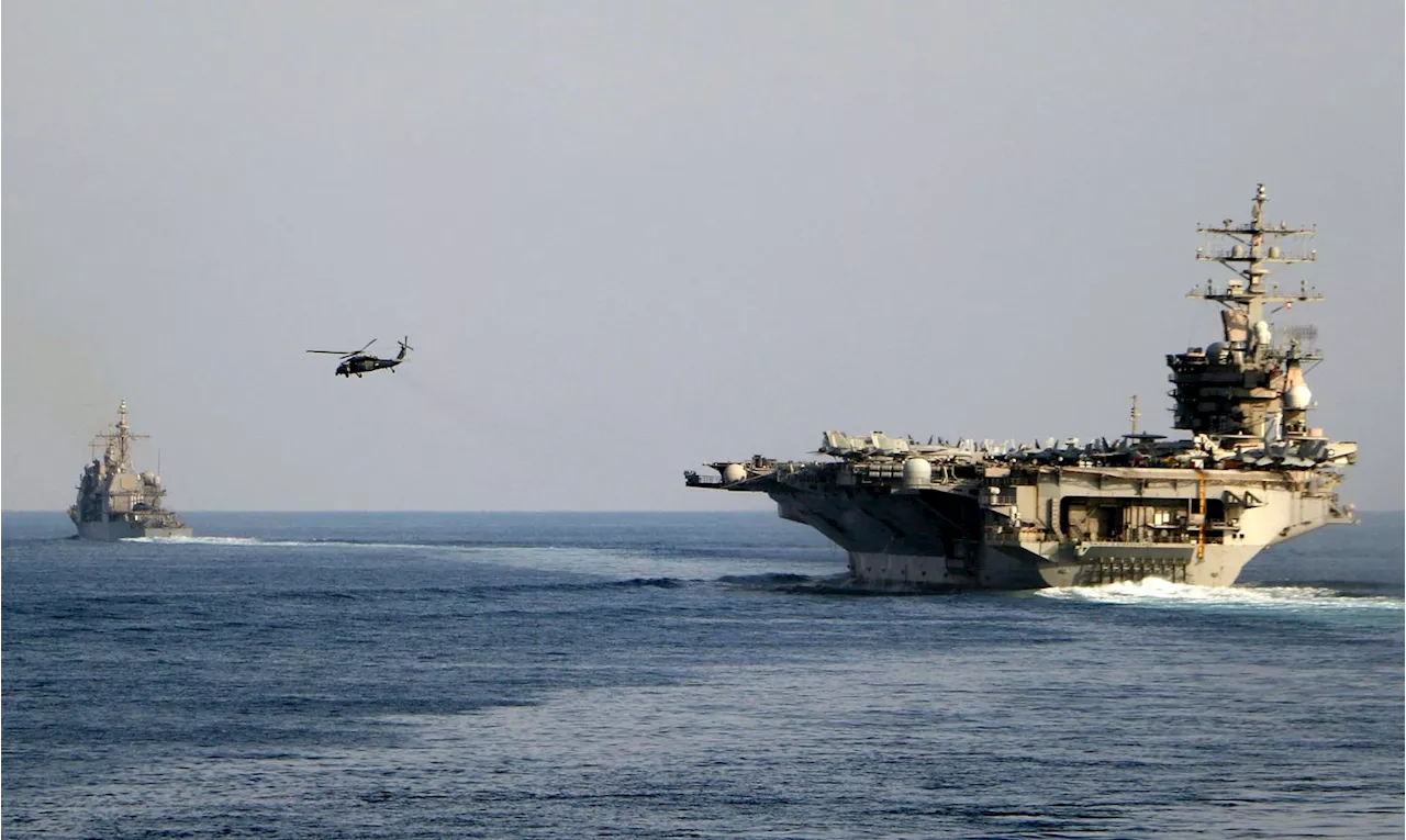 Photos Purport To Show Damage To U.S. Aircraft Carrier After Houthi Missile Strike