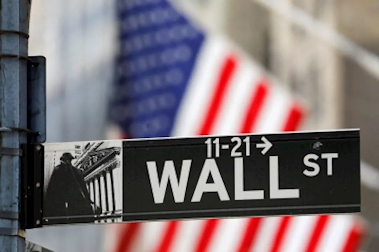 Wall Street stocks close slightly lower; jobs data strong but rates still high