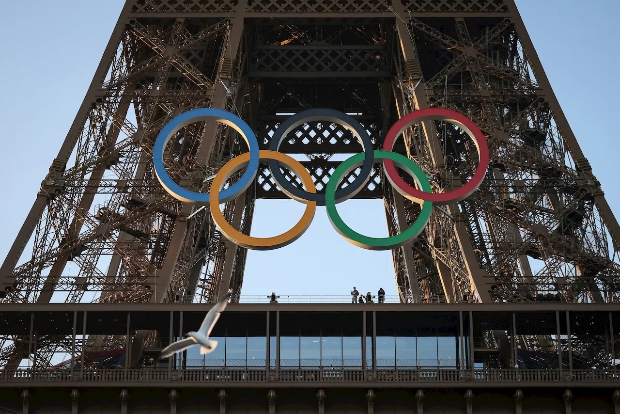 Olympic rings adorn Eiffel Tour with 50 days remaining before Summer Games begin