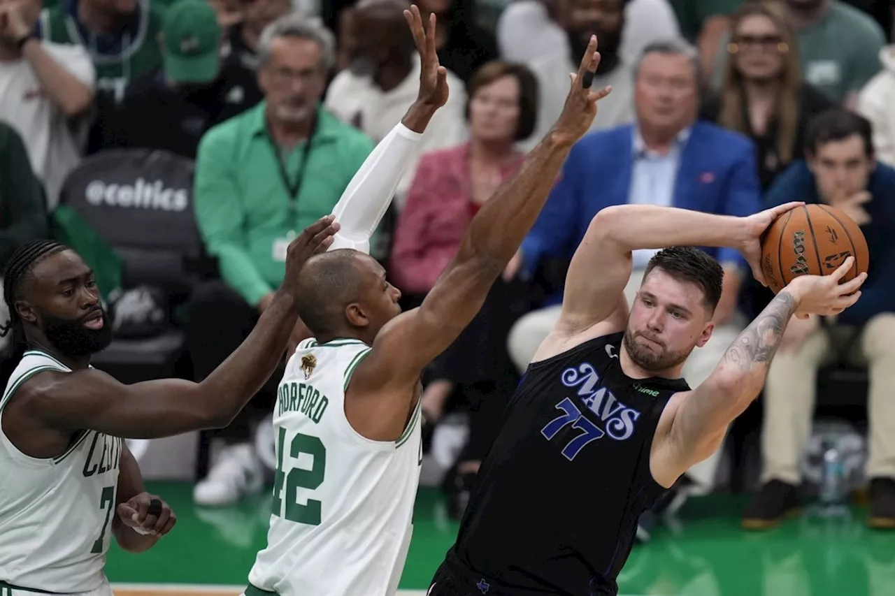 Celtics rout Mavericks 107-89 in Game 1 of NBA Finals behind Brown, returning Porzingis