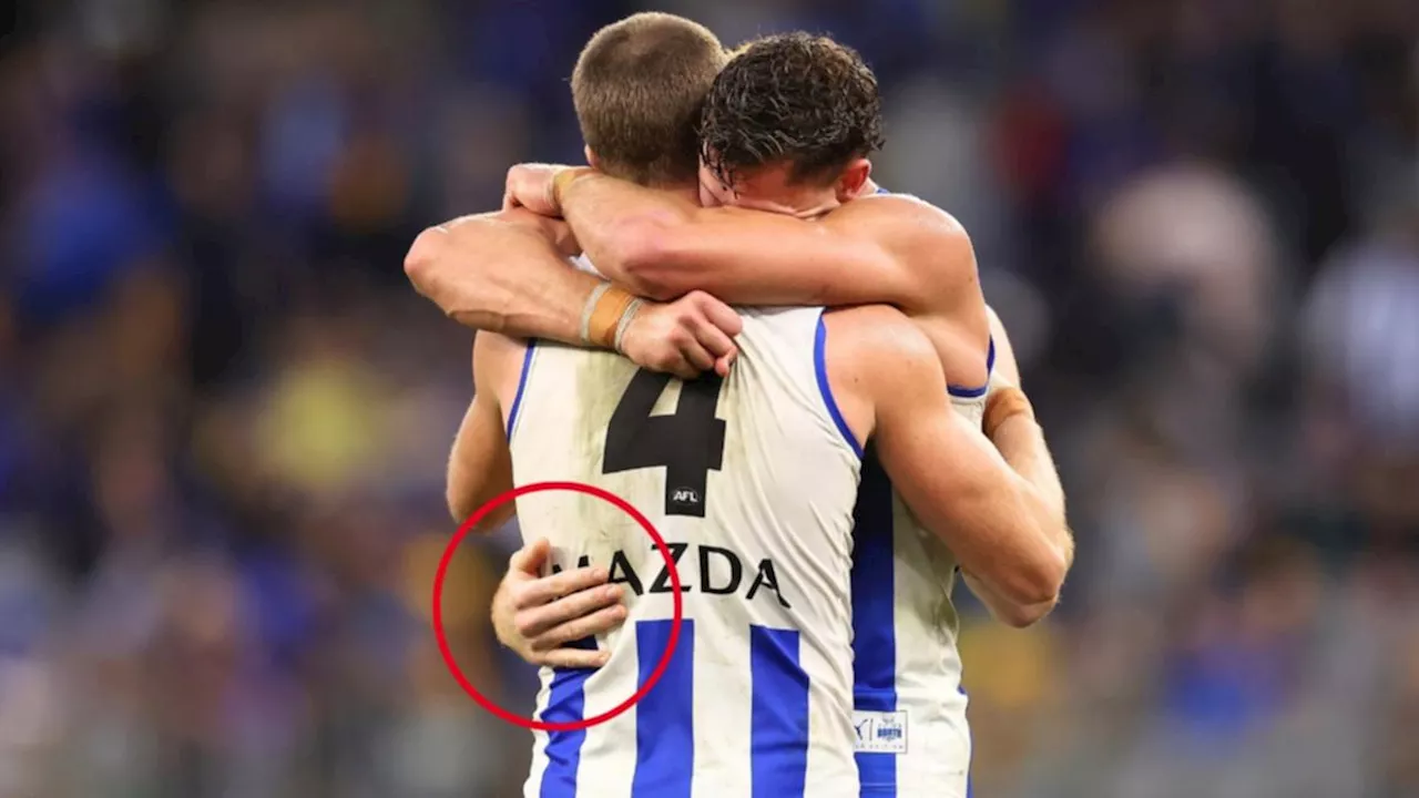 AFL photographer Paul Kane snaps ‘genuinely creepy’ image with ‘extra hand’ after North Melbourne’s first win