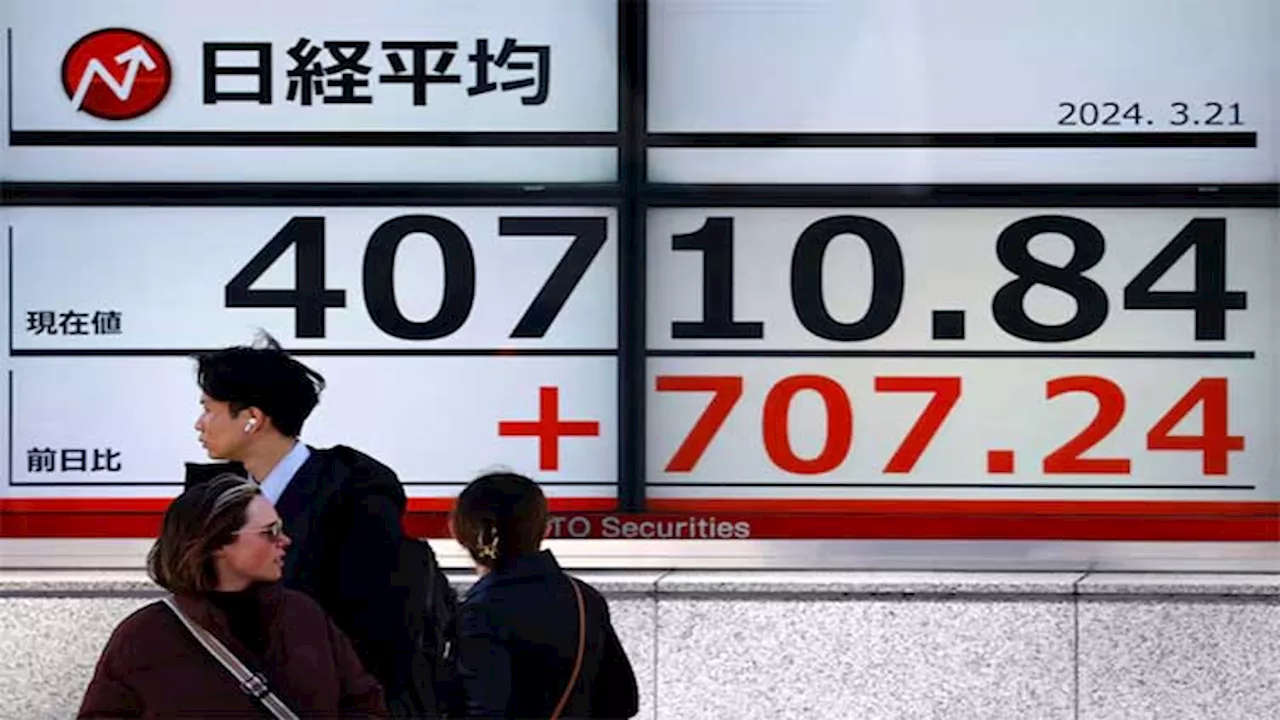 Asia shares set for weekly gain on rate-cut rally