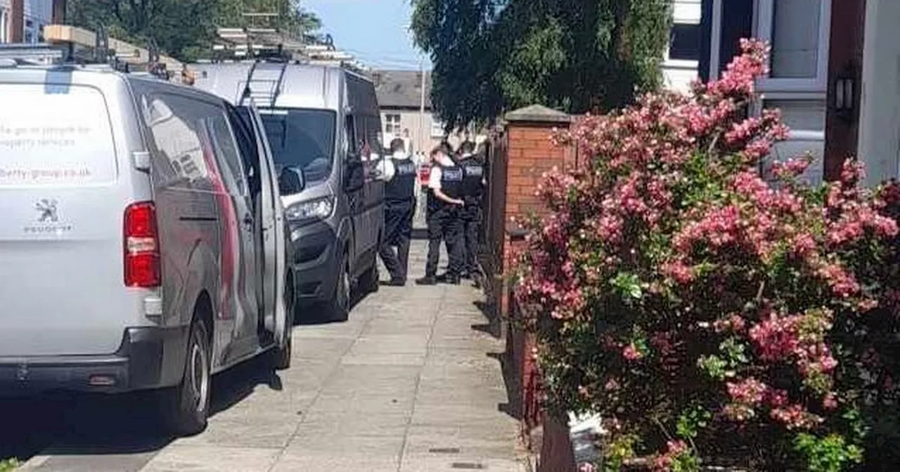 Man arrested after armed police swoop on street