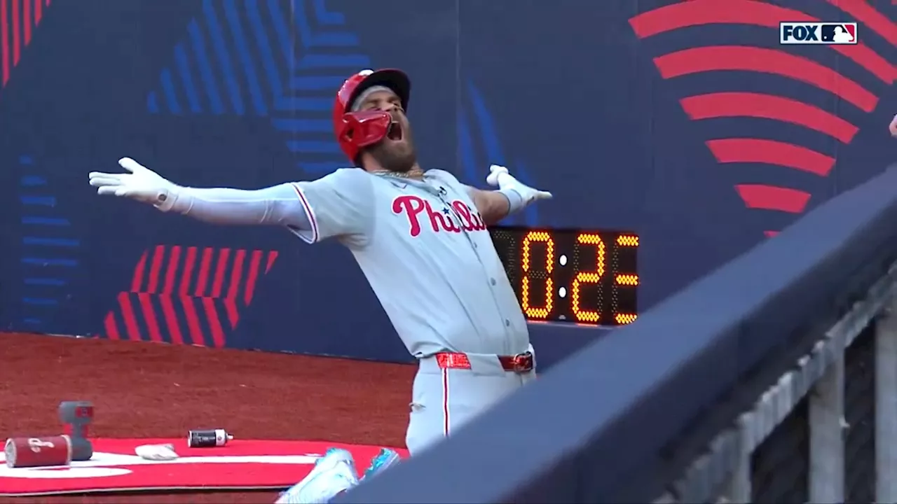 – Bryce Harper pulls off football-style celebration as Phillies beat Mets in London Seri...