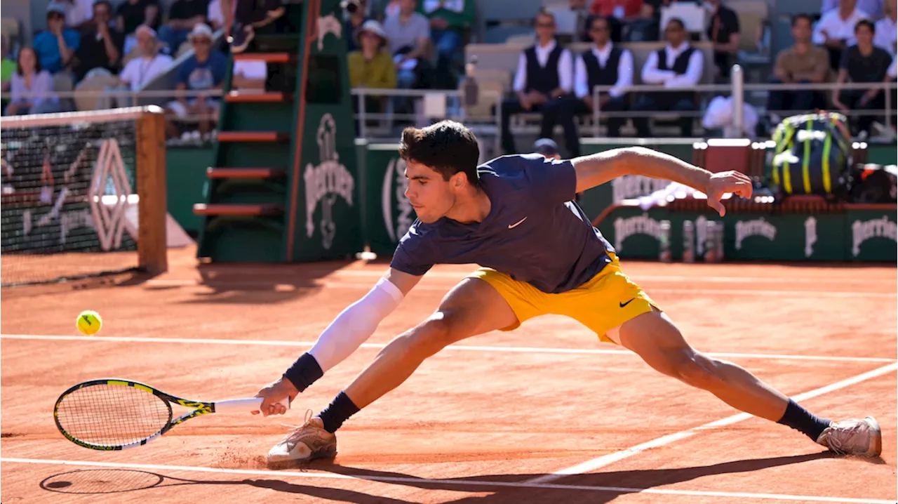 Alcaraz downs Sinner to reach French Open final