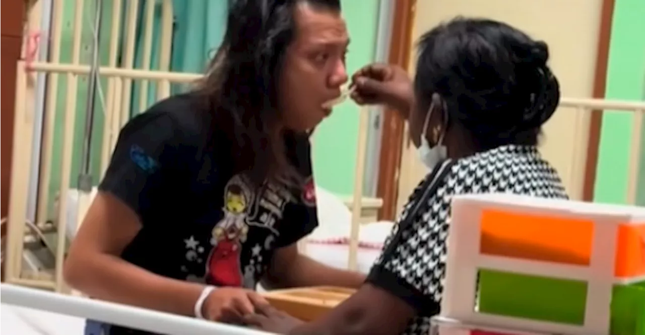 Elderly woman feeds stranger in hospital bed, tugging netizens’ heartstrings