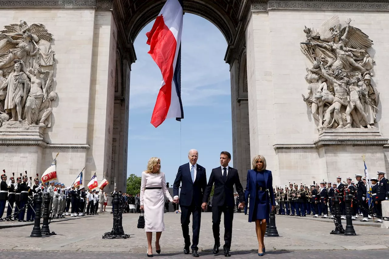 Macron recibe a Biden en el Arco del Triunfo en el inicio de la visita bilateral