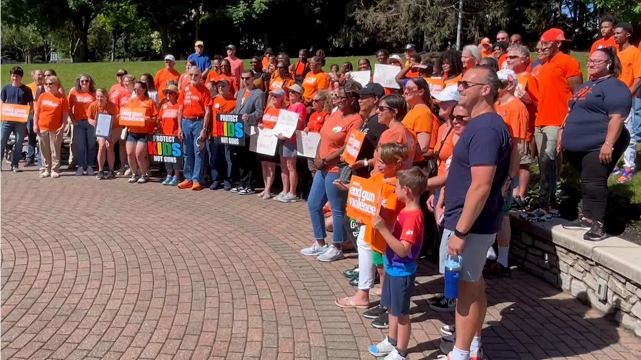 Gun violence awareness advocates gather on the downtown canal for National Gun Violence Awareness Day