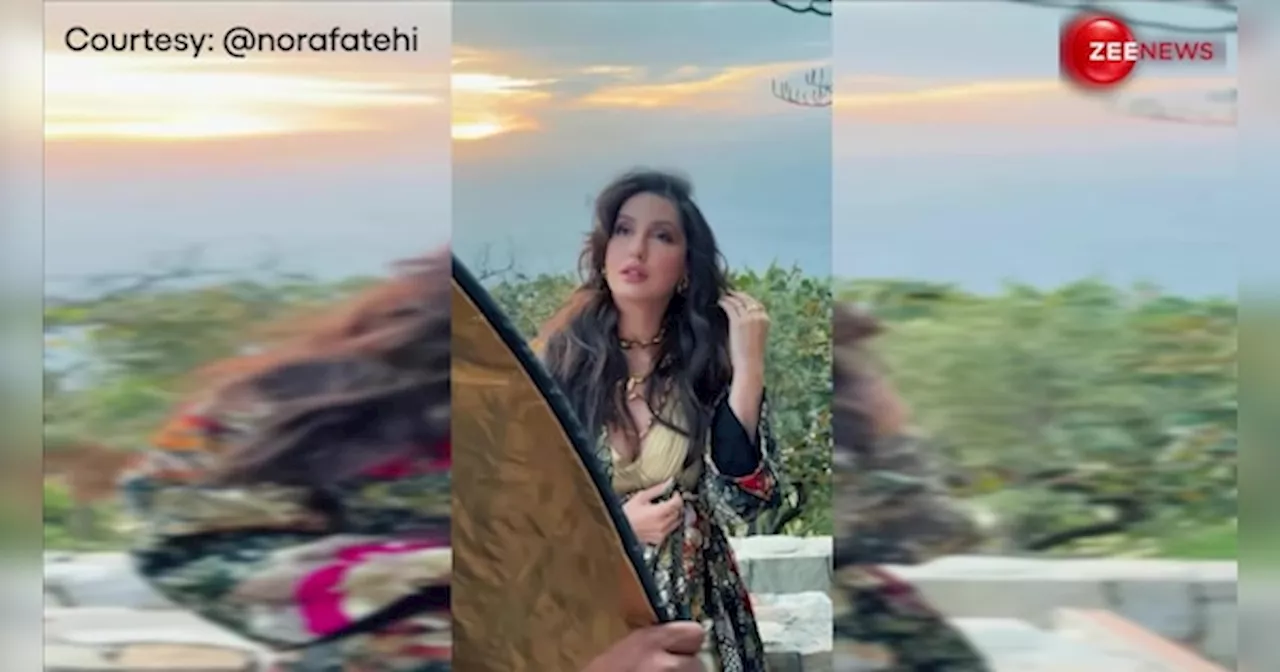 फोटोशूट के बीच Nora Fatehi ने दिखाया ग्लैमरस अवतार, गोल्डन ड्रेस में बाल झटकाते हुए दिए टेम्पटिंग पोज