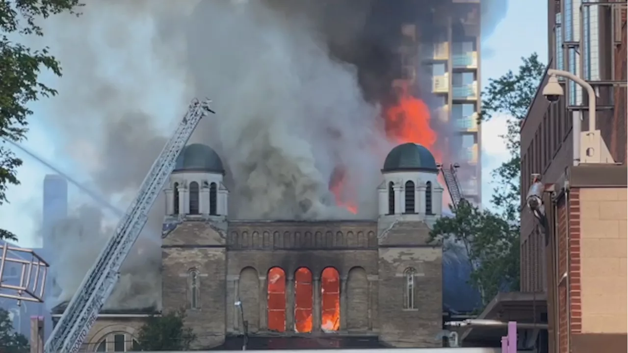 Crews battling fire at Toronto church with historic Group of 7 mural