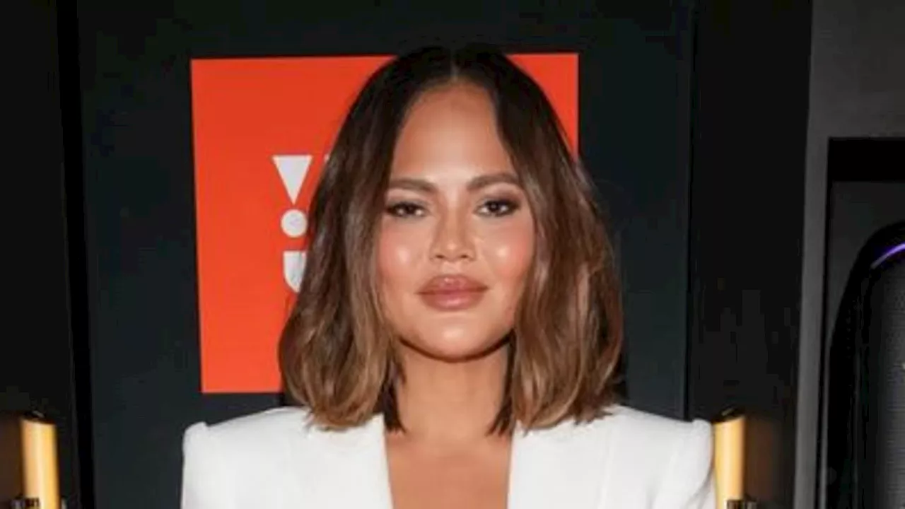 Chrissy Teigen fires back at a medical professional who accused her of having fillers