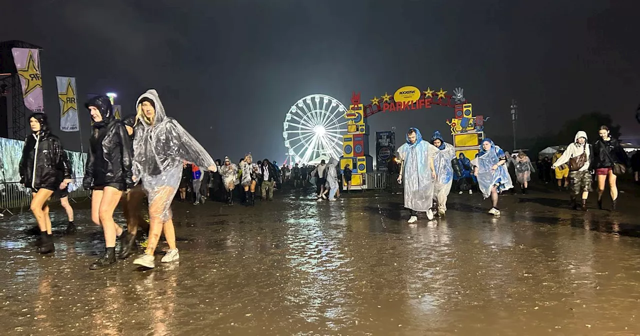 Parklife hit with deluge as site becomes a 'mud bath' amid 'torrential' rain