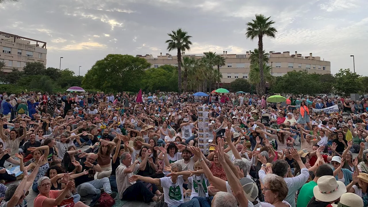 Thousands march against mass tourism in Spain's Balearic Islands as protesters take to streets of Mallorca and Menorca