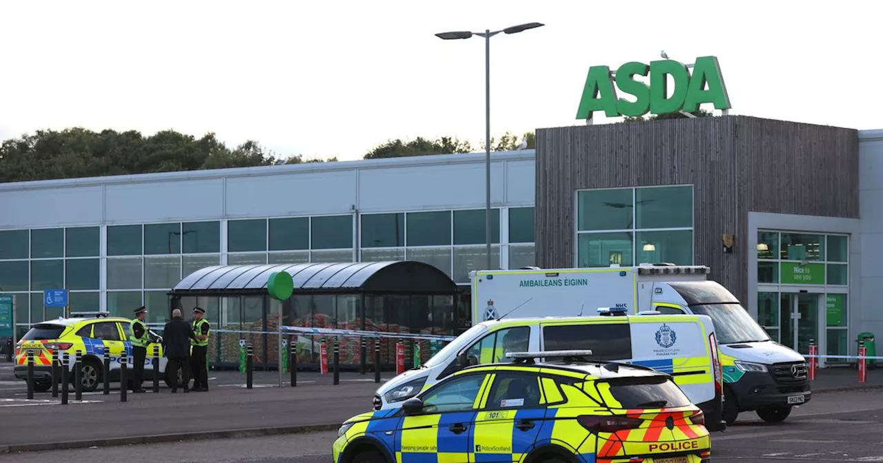 Man found dead at Scots Asda as woman charged by police