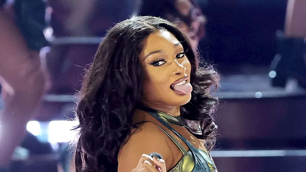 Megan Thee Stallion showcases her incredible figure in cheeky green look and emerges from an egg as...