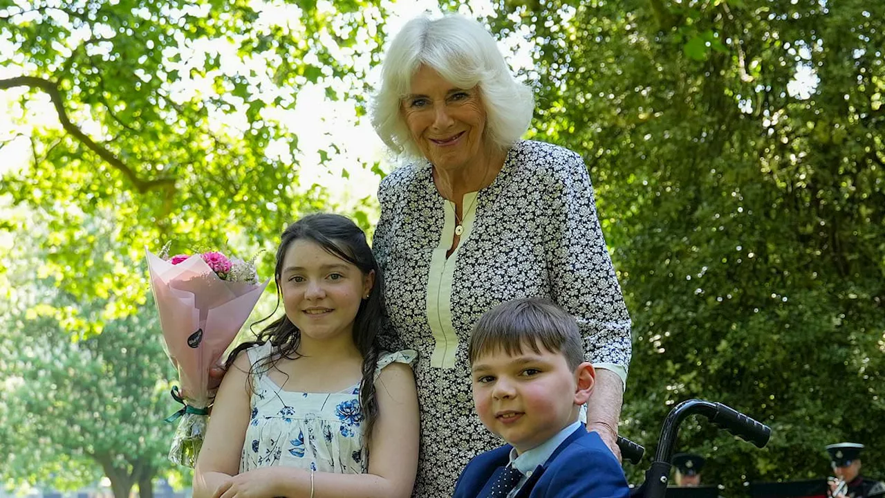 Queen Camilla hosts special Buckingham Palace garden party for young fundraising heroes Lyla...