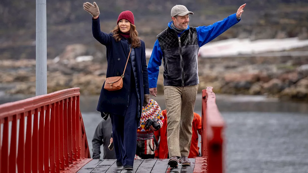 Queen Mary of Denmark walks hand-in-hand with King Frederik during visit to Greenland alongside twin...