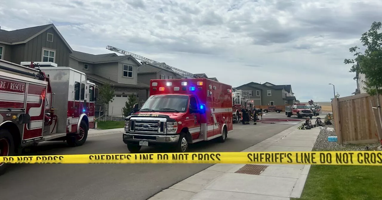 Woman found dead inside burning home in Aurora Monday morning