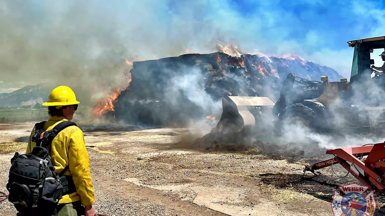 Haybale fire in Weber County spreads to surrounding grass, threatens structures