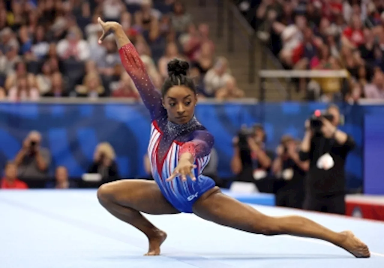 Simone Biles books Paris Olympics berth with US gymnastics trials all-around win