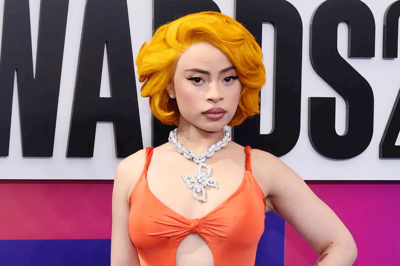 Ice Spice Is a Vixen in Vintage Versace Gown That Dips Below Her Belly Button at 2024 BET Awards