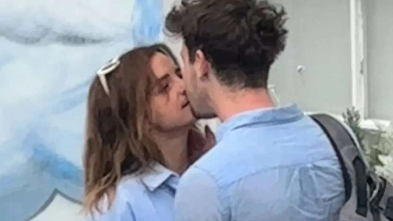 Loved up Harry Potter legend Emma Watson snogs mystery man after split from businessman boyfriend...