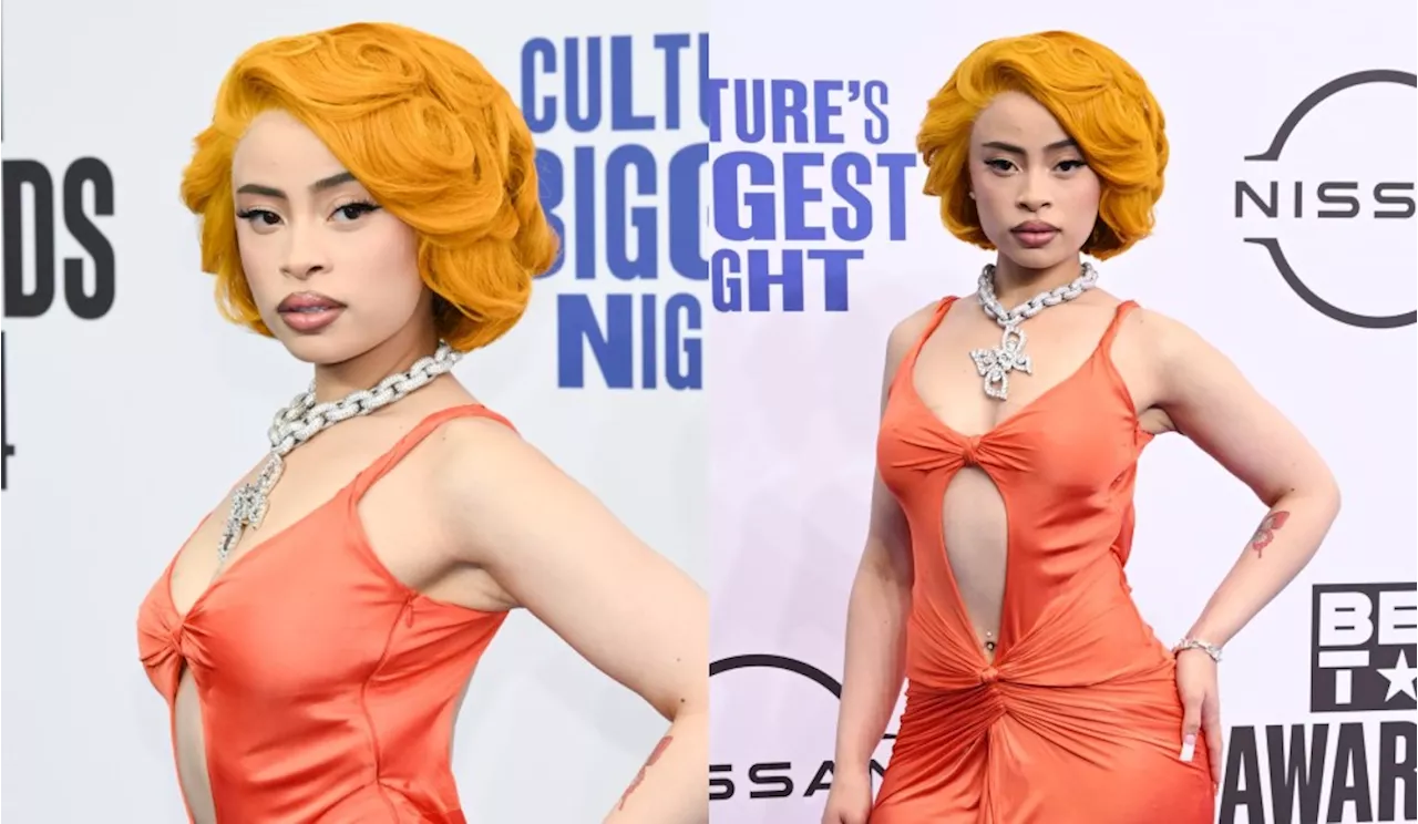 Ice Spice Embraces Cutouts in Orange Archival Versace Dress on the BET Awards 2024 Red Carpet