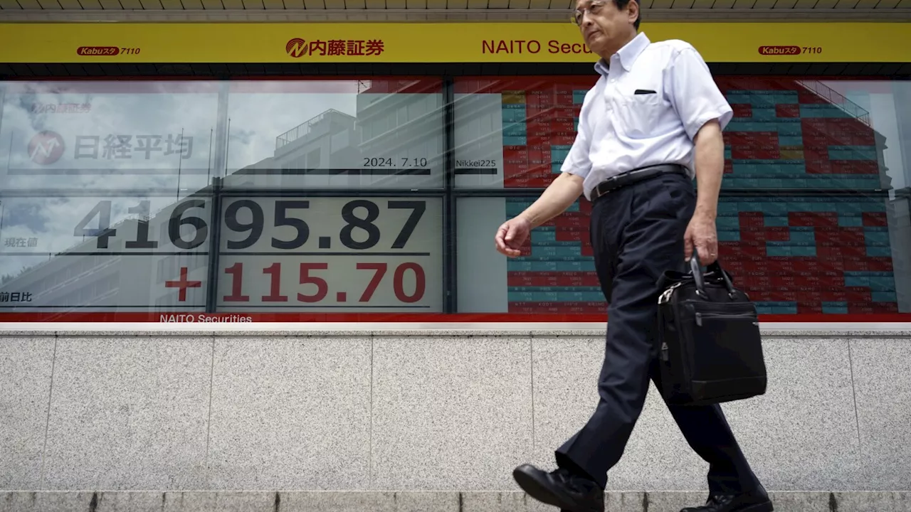 Japan's Nikkei 225 share index surges to another record high, approaching 42,000