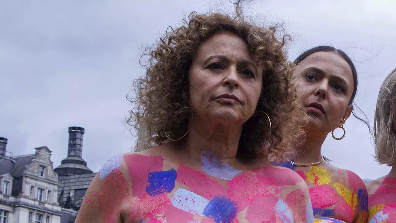 Nadia Sawalha goes topless outside Parliament in a bold statement for breast cancer as presenter...