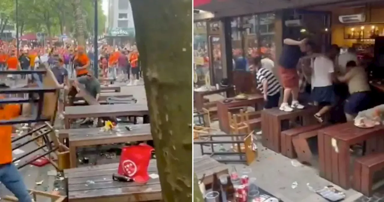 Dutch fans fling chairs and bottles at England supporters before Euro semi-final