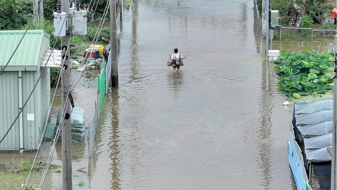 Rains pound South Korea causing landslides, bullet trains slowed