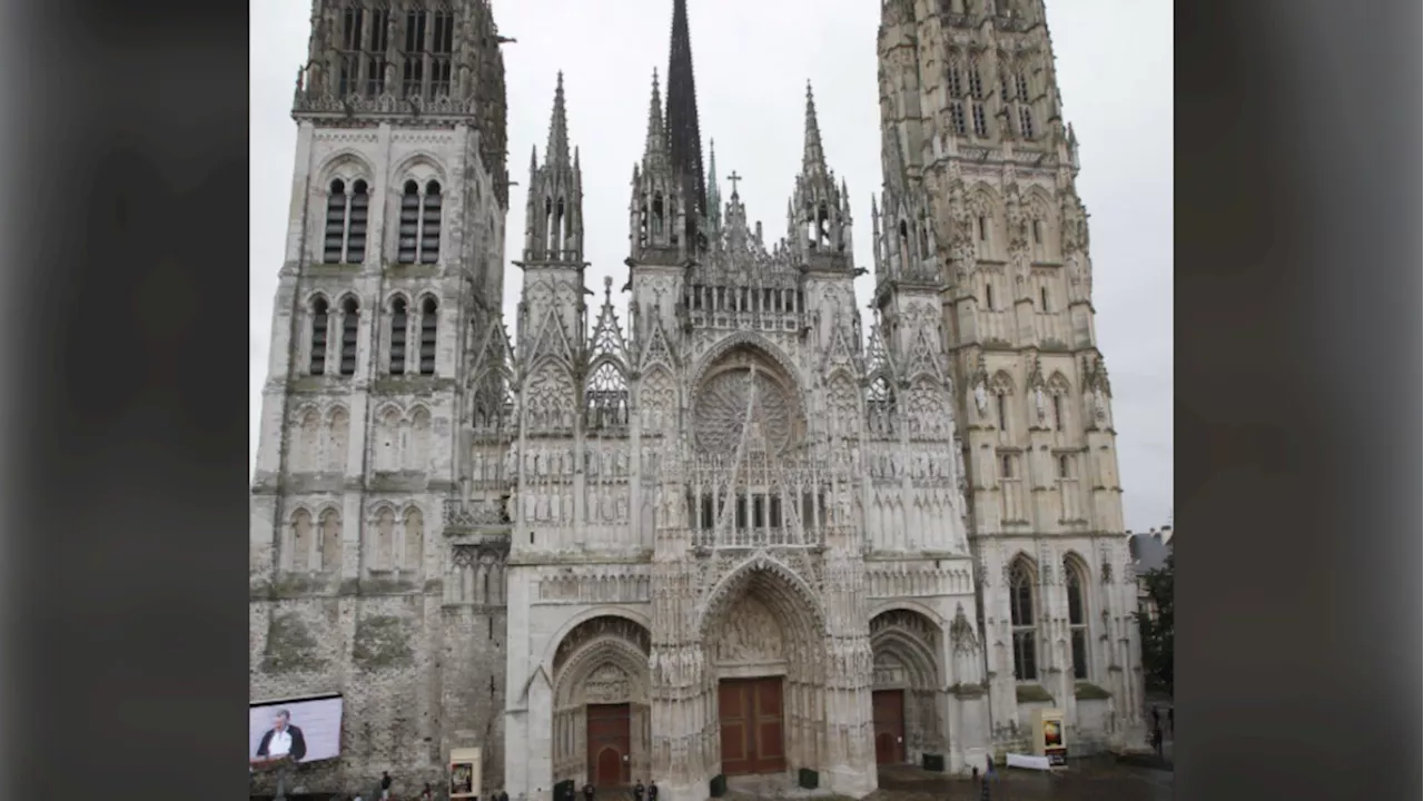 Fire breaks out in the spire of the medieval cathedral in the French city of Rouen