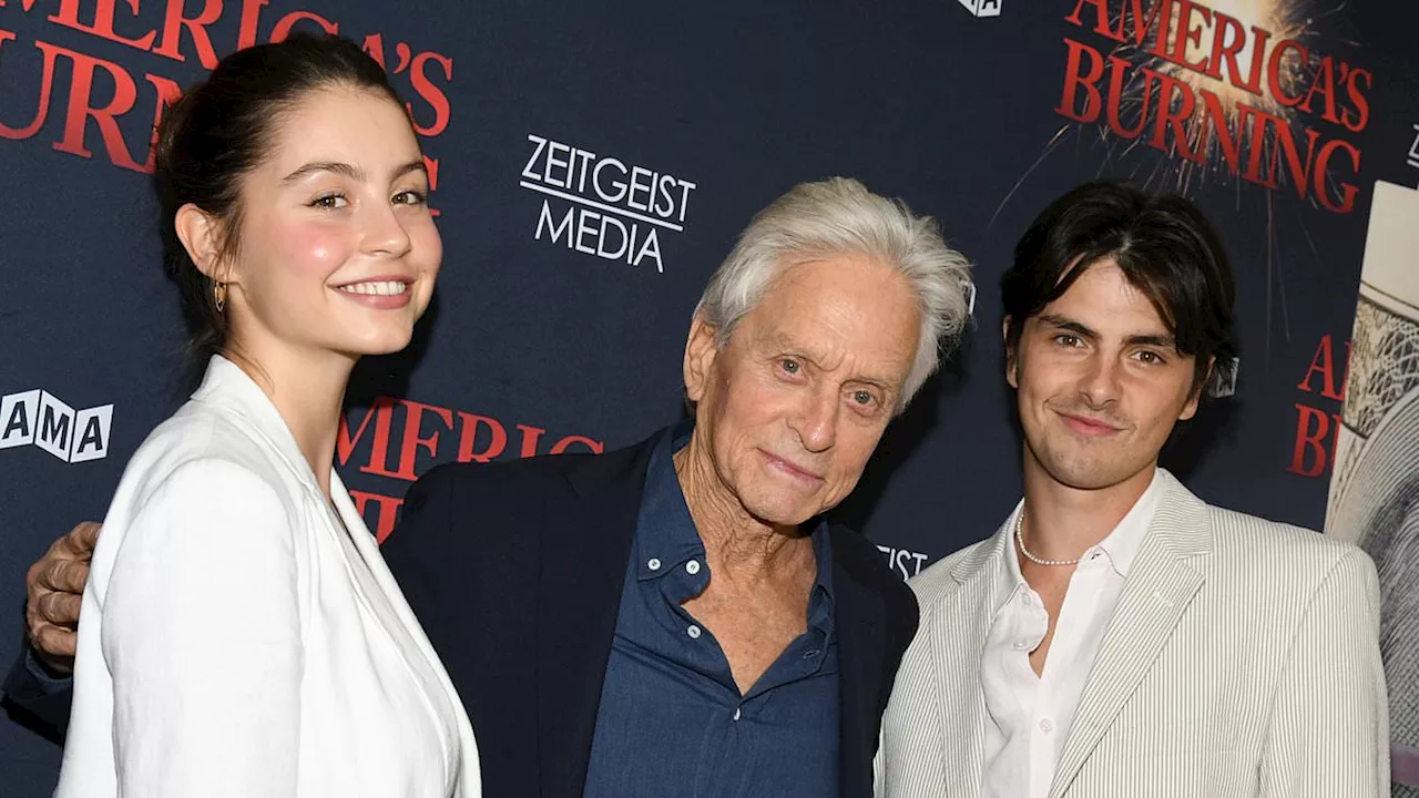 Michael Douglas, 79, is a proud dad with son Dylan, 23, and daughter Carys, 21, by his side at...