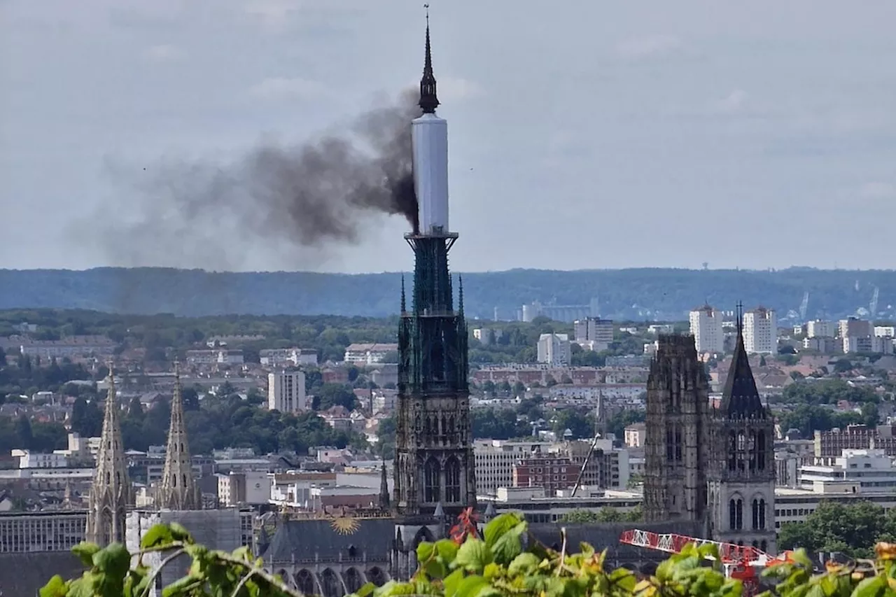 Rouen cathedral spire in northern France catches fire, firefighters working to control blaze