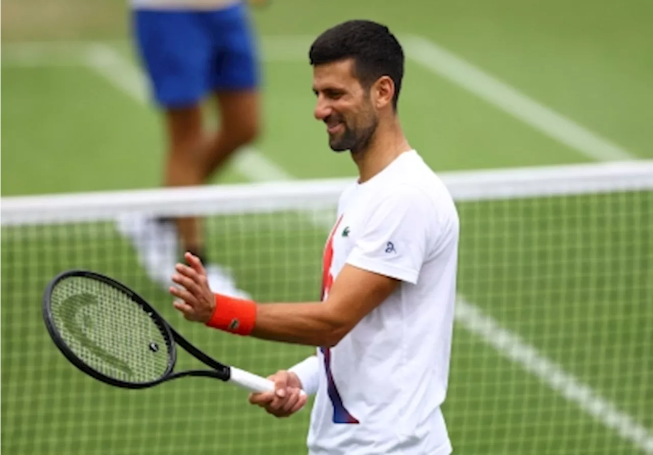 Djokovic gets free pass to Wimbledon semi-finals as Rybakina cruises